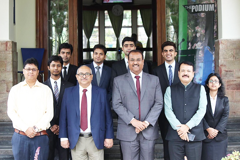 Mr. Tapan Singhel with students and faculty members of IIM Shillong